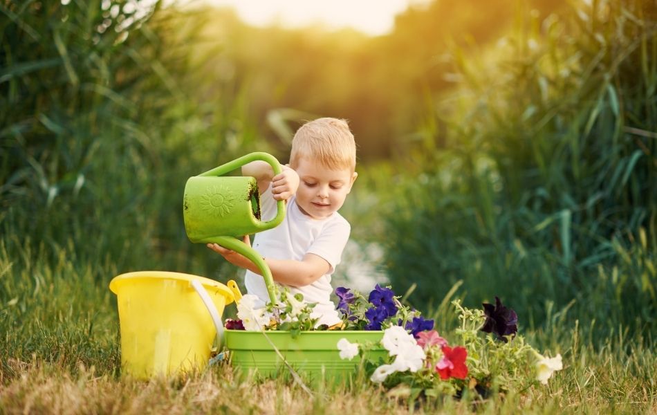 children watering plants
